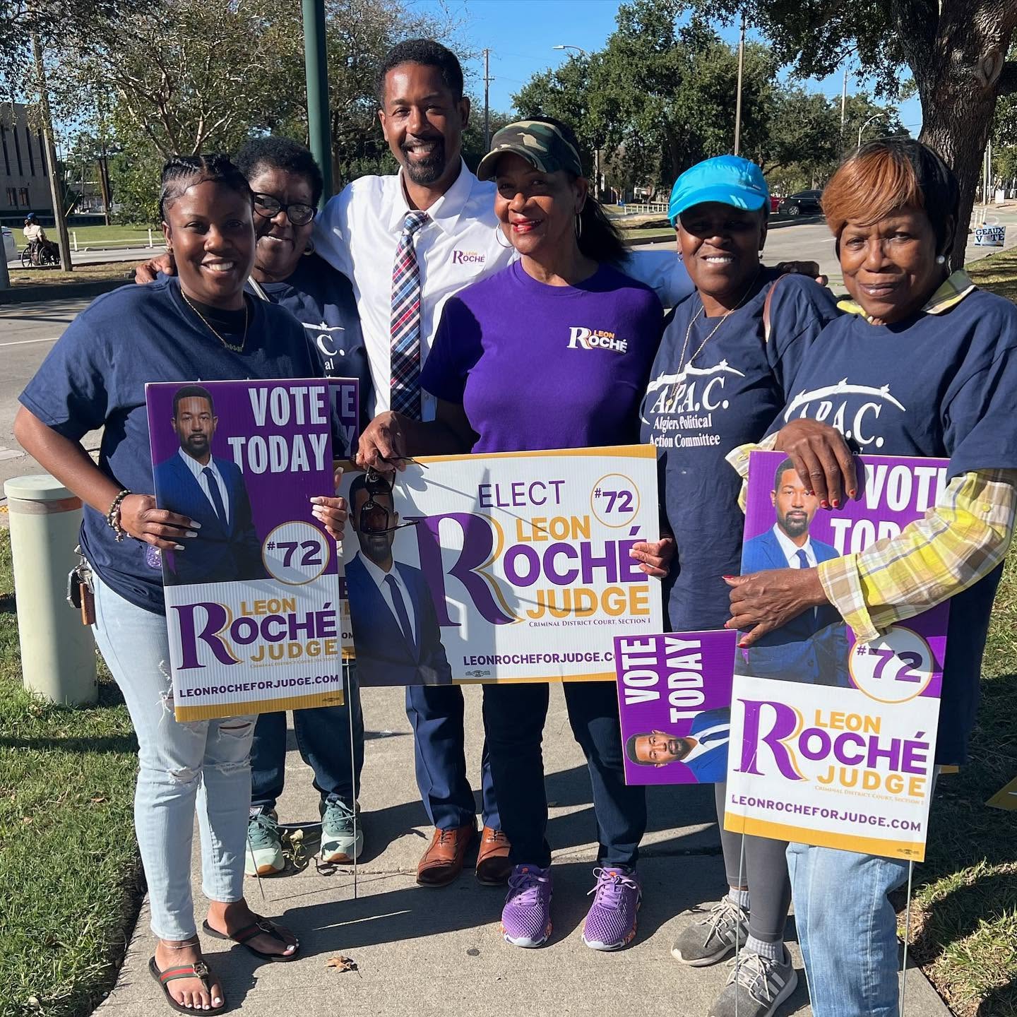 Judge Roché speaking with a supporter